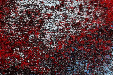 Kırık tarih arkaplanı olan kırmızı, mavi ve siyah grunge duvar