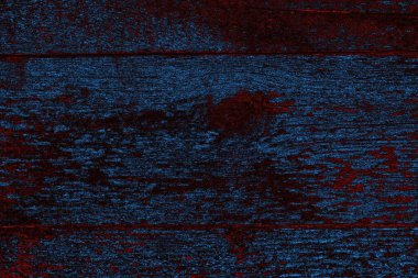 Kırık tarih arkaplanı olan kırmızı, mavi ve siyah grunge duvar