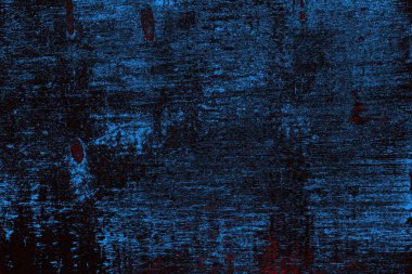 Koyu renkli ses, arka planda çatlaklar olan grunge duvar dokusu