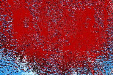 kırmızı mavi ve siyah duvar dokusu ve soyulmuş eski boya. 
