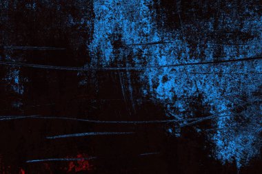 Koyu renkli ses, arka planda çatlaklar olan grunge duvar dokusu