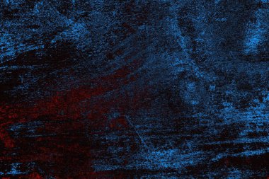 Koyu renkli ses, arka planda çatlaklar olan grunge duvar dokusu