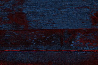 Kırık tarih arkaplanı olan kırmızı, mavi ve siyah grunge duvar