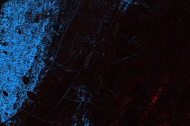 Koyu renkli ses, arka planda çatlaklar olan grunge duvar dokusu