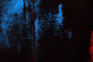 Koyu renkli ses, arka planda çatlaklar olan grunge duvar dokusu