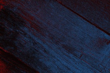 Kırık tarih arkaplanı olan kırmızı, mavi ve siyah grunge duvar