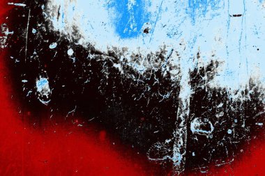 kırmızı mavi ve siyah duvar dokusu ve soyulmuş eski boya. 