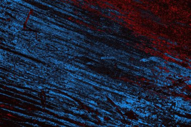 Koyu renkli ses, arka planda çatlaklar olan grunge duvar dokusu