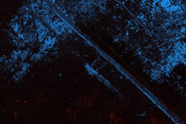 Koyu renkli ses, arka planda çatlaklar olan grunge duvar dokusu