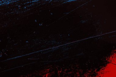 Kırık tarih arkaplanı olan kırmızı, mavi ve siyah grunge duvar