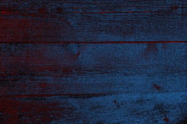 Kırık tarih arkaplanı olan kırmızı, mavi ve siyah grunge duvar