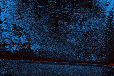 Koyu renkli ses, arka planda çatlaklar olan grunge duvar dokusu