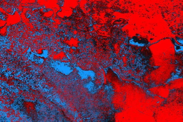 Neon kırmızı ve mavi renkli grunge duvar dokusu arkaplanı