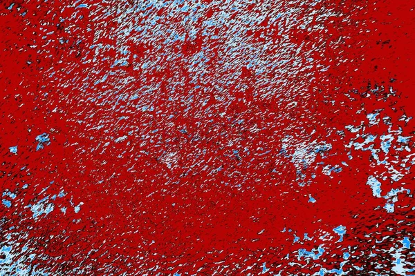 kırmızı mavi ve siyah duvar dokusu ve soyulmuş eski boya. 