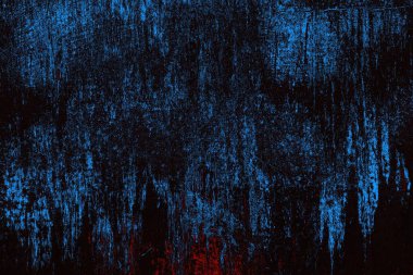 Koyu renkli ses, arka planda çatlaklar olan grunge duvar dokusu