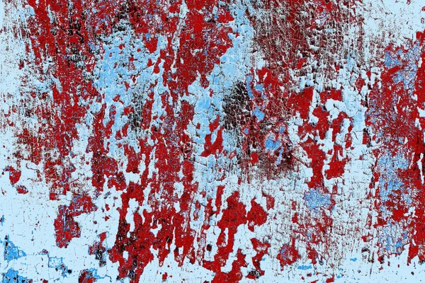 Kırık tarih arkaplanı olan kırmızı, mavi ve siyah grunge duvar