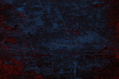 Koyu renkli ses, arka planda çatlaklar olan grunge duvar dokusu