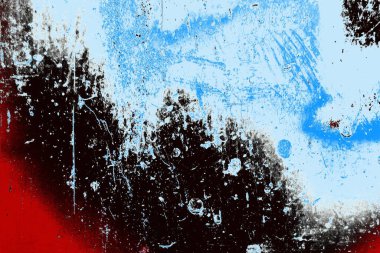 kırmızı mavi ve siyah duvar dokusu ve soyulmuş eski boya. 