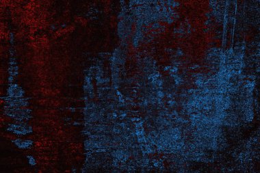 Koyu renkli ses, arka planda çatlaklar olan grunge duvar dokusu