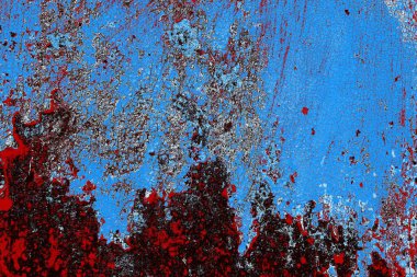Kırık tarih arkaplanı olan kırmızı, mavi ve siyah grunge duvar