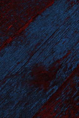 Kırık tarih arkaplanı olan kırmızı, mavi ve siyah grunge duvar