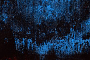 Koyu renkli ses, arka planda çatlaklar olan grunge duvar dokusu