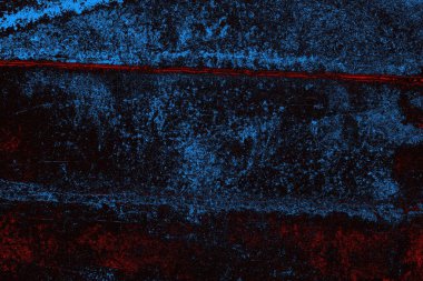 Kırık tarih arkaplanı olan kırmızı, mavi ve siyah grunge duvar