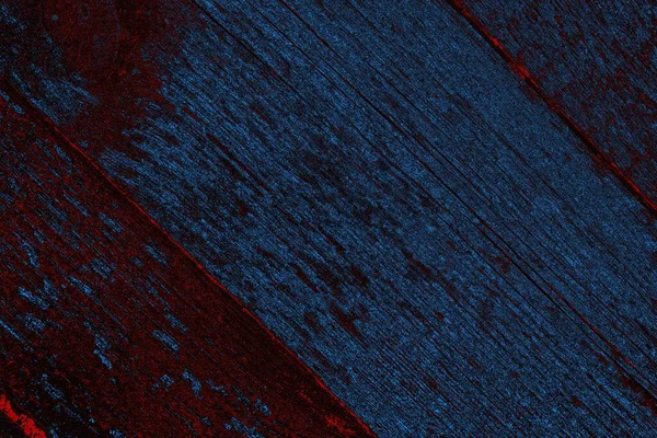 Kırık tarih arkaplanı olan kırmızı, mavi ve siyah grunge duvar