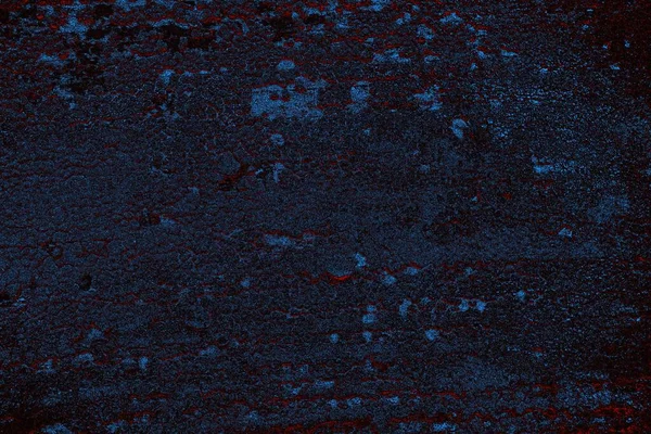 Koyu renkli ses, arka planda çatlaklar olan grunge duvar dokusu