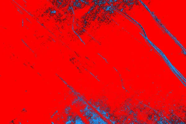 Neon kırmızı ve mavi renkli grunge duvar dokusu arkaplanı
