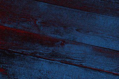 Kırık tarih arkaplanı olan kırmızı, mavi ve siyah grunge duvar