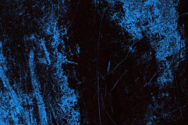 Koyu renkli ses, arka planda çatlaklar olan grunge duvar dokusu