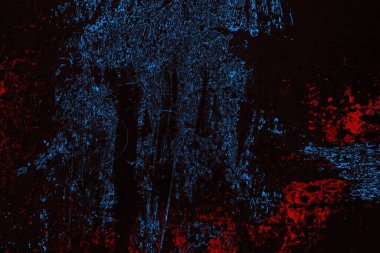 Koyu renkli ses, çatlak ve arkaplanı su sıçratan grunge duvar dokusu