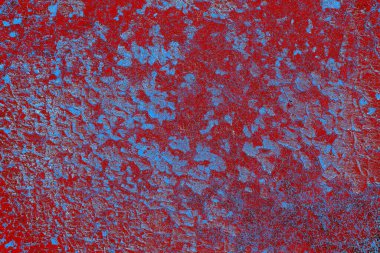 Kırık tarih arkaplanı olan kırmızı, mavi ve siyah grunge duvar