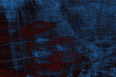 Koyu renkli ses, arka planda çatlaklar olan grunge duvar dokusu