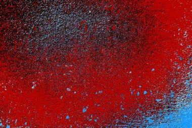 kırmızı mavi ve siyah duvar dokusu ve soyulmuş eski boya. 
