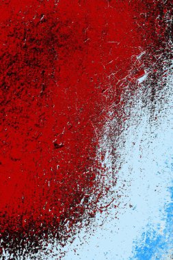 Kırık tarih arkaplanı olan kırmızı, mavi ve siyah grunge duvar