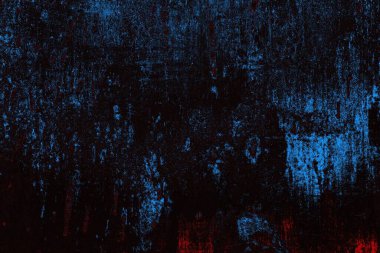 Koyu renkli ses, arka planda çatlaklar olan grunge duvar dokusu