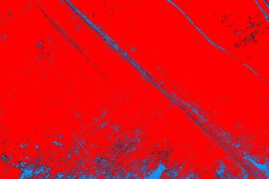 Neon kırmızı ve mavi renkli grunge duvar dokusu arkaplanı