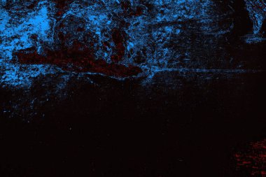 Koyu renkli ses, arka planda çatlaklar olan grunge duvar dokusu