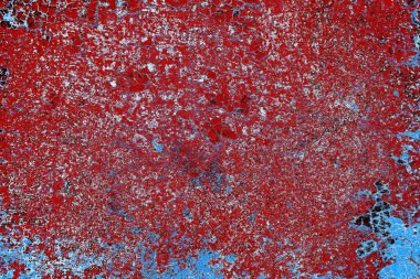 Kırık tarih arkaplanı olan kırmızı, mavi ve siyah grunge duvar