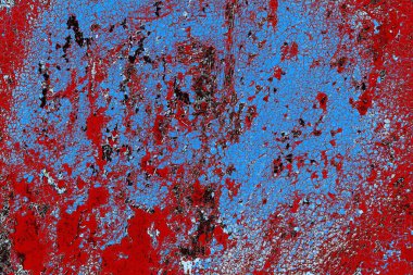 Kırık tarih arkaplanı olan kırmızı, mavi ve siyah grunge duvar