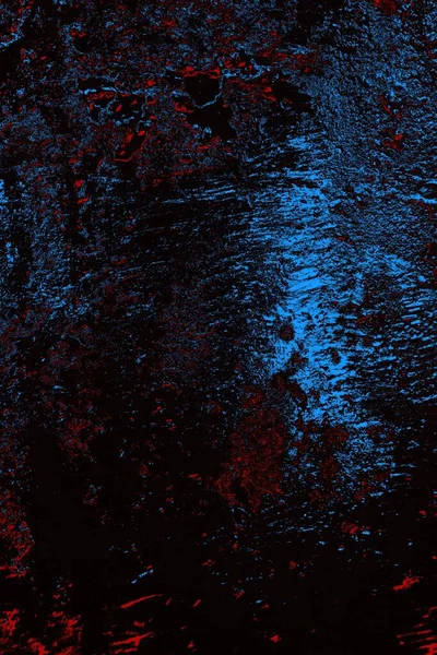Kırık tarih arkaplanı olan kırmızı, mavi ve siyah grunge duvar
