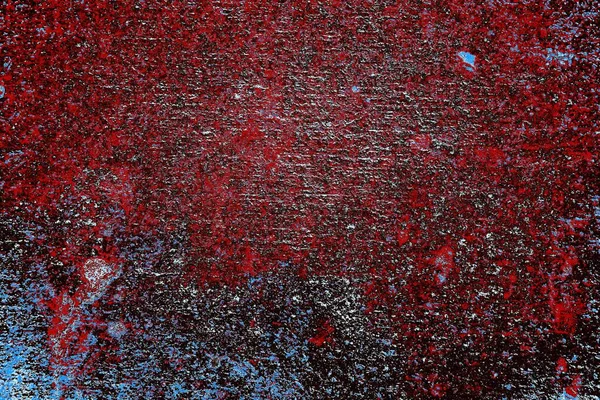 Kırık tarih arkaplanı olan kırmızı, mavi ve siyah grunge duvar