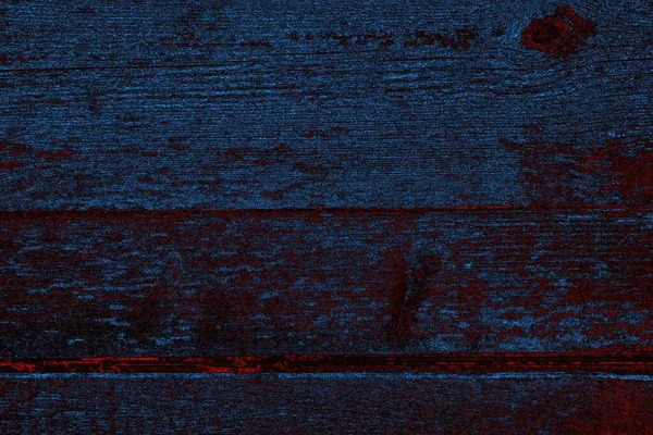 Kırık tarih arkaplanı olan kırmızı, mavi ve siyah grunge duvar