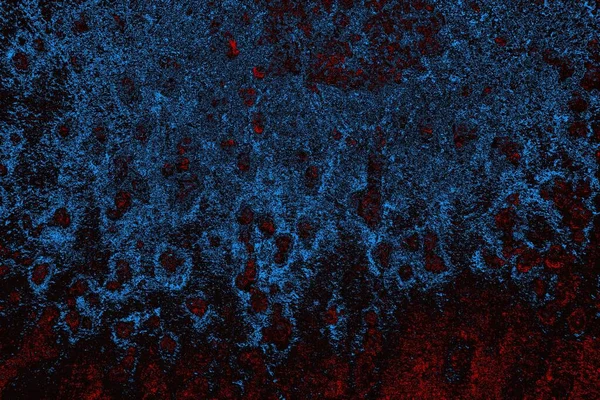 Kırık tarih arkaplanı olan kırmızı, mavi ve siyah grunge duvar