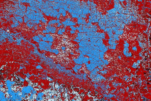 Kırık tarih arkaplanı olan kırmızı, mavi ve siyah grunge duvar