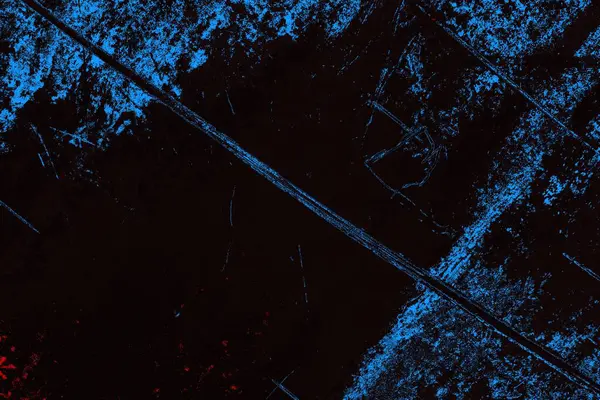 Koyu renkli ses, arka planda çatlaklar olan grunge duvar dokusu