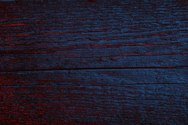 Kırık tarih arkaplanı olan kırmızı, mavi ve siyah grunge duvar