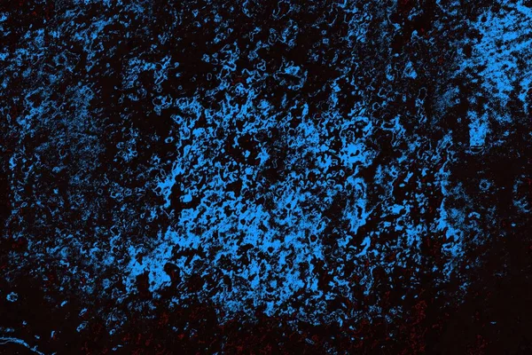 Koyu renkli ses, çatlak ve arkaplanı su sıçratan grunge duvar dokusu